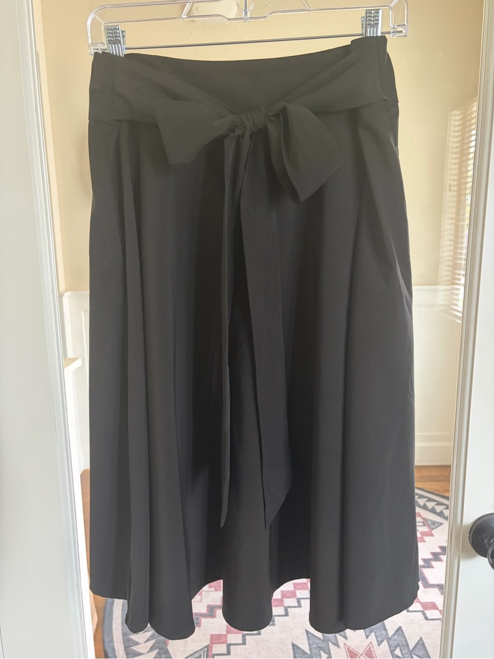 High-Waist Black A-Line Midi Skirt with a Front Tie